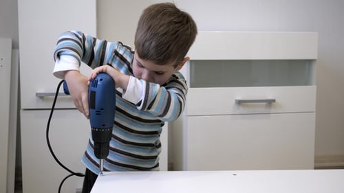 Child Helps Parents Furniture Assembly