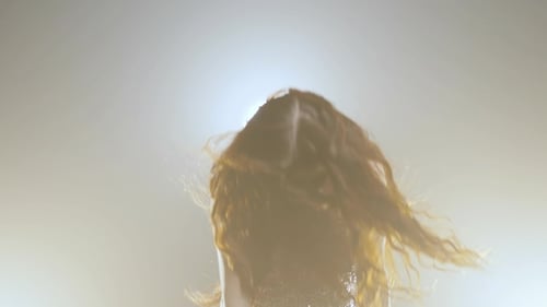 Violinist Woman Performs Beautifully in Shimmery Dress