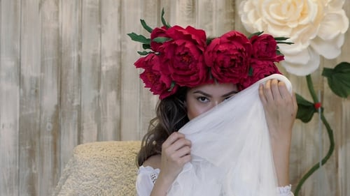 Woman With Flower Crown and Flowing Fabric