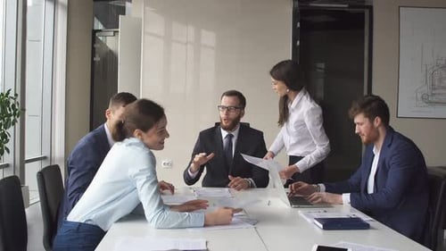 Corporate Team Engaged in Productive Meeting