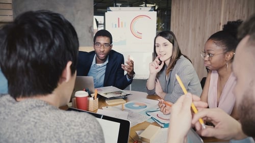 African American Businessman Leads Office Meeting. Young Multiethnic Group Develop Business