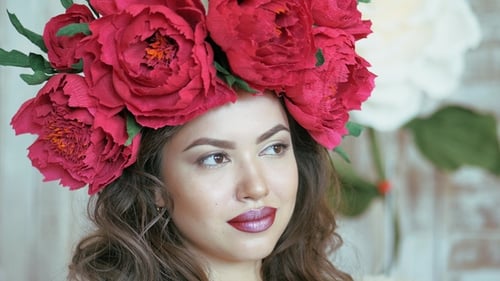 Woman with Floral Crown and Curly Hair