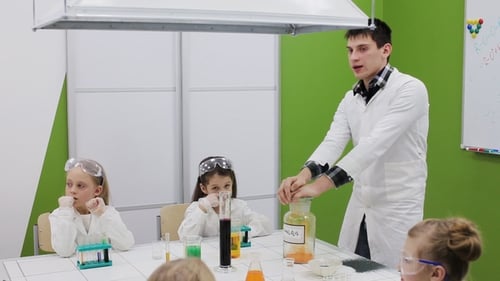 Science Lesson with Colorful Experiments in Classroom