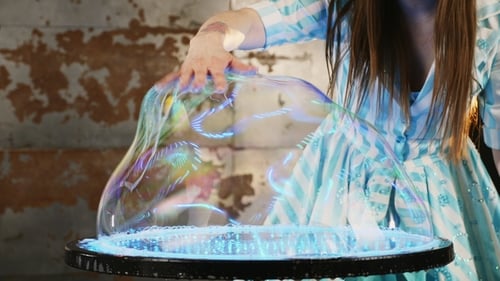 Woman Creates Giant Colorful Soap Bubbles