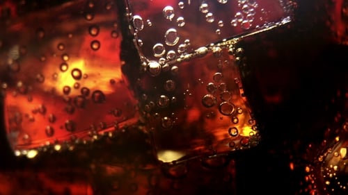 Refreshing Soft Drink with Ice Cubes, Macro Shot