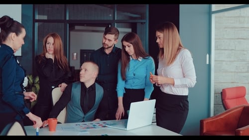 Confident and Attractive Business Group Meets in a Modern Office Building.