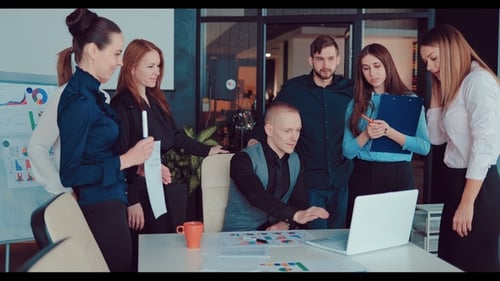 Confident and Attractive Business Group Meets in a Modern Office Building.