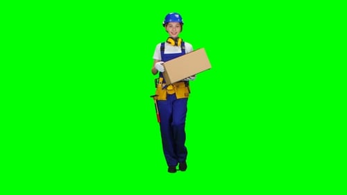 Constructor lleva una caja de cartón