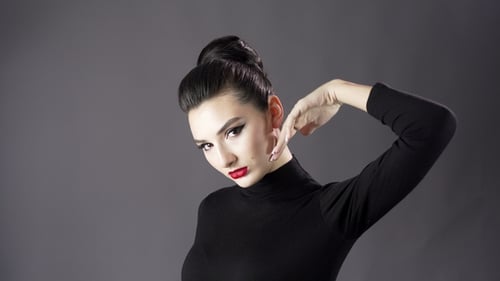 Woman Posing with Elegant Makeup in Studio