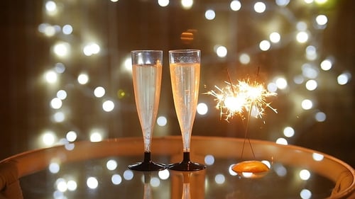 Festive Champagne Toast with Burning Sparkler