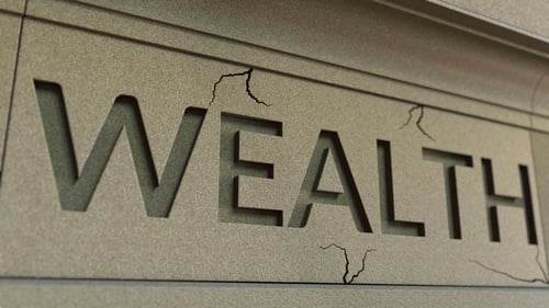Cracking WEALTH Word on the Stone Facade