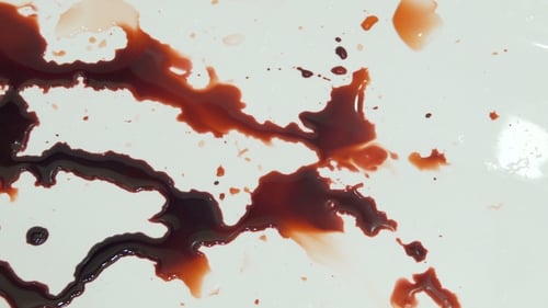 Panning Shot of Blood Pooling in Sink