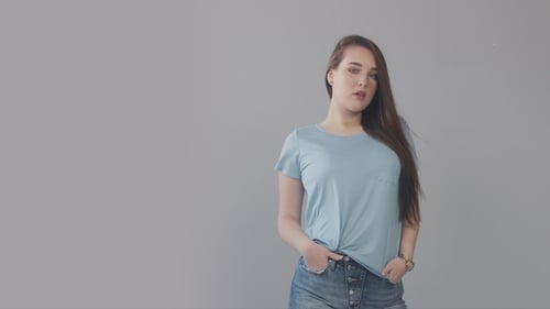 Caucasian Young Woman with Long Hair in Studio