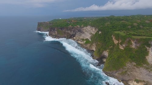 Aerial Top View of Rocks and Blue Ocean Waves in Bali