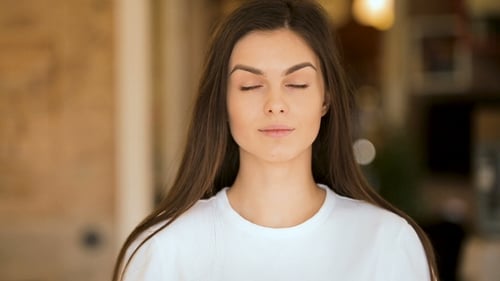 Young Woman Smiling in Close Up Portrait