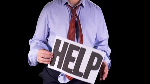 Distressed Person Holds a Sign That Says HELP