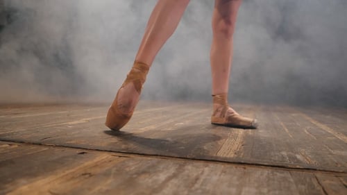 Elegant Legs of Ballerina in Pointe Shoes