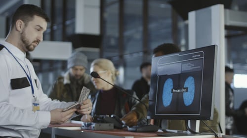 Airport Security Processing a Thumb Print