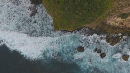Rocks and Blue Ocean Waves in Bali