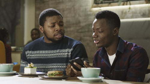 Black Men Having Fun in Cafeteria