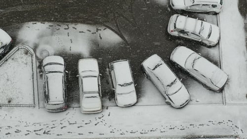 Snow Falling in Town, Snowy Weather. Snowing in Winter
