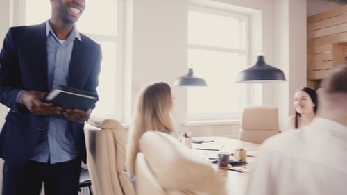 Multiethnic Business People Talk, Shake Hands at Office Meeting. Happy Young Colleagues Chatting and