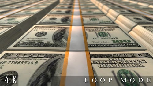 Flying Over Stacks of United States 100 Dollar Bills