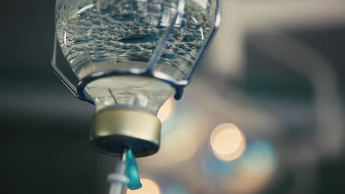 A Crystalline Drop Counter in a Surgery Room with Smudgy Lamps in Ukraine