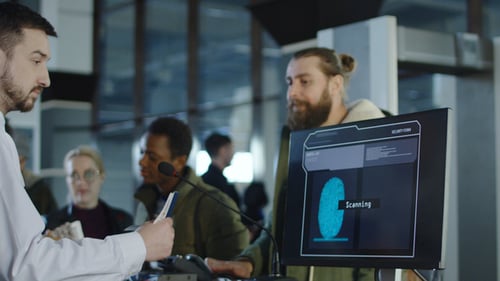 Airport Security Processing a Thumb Print