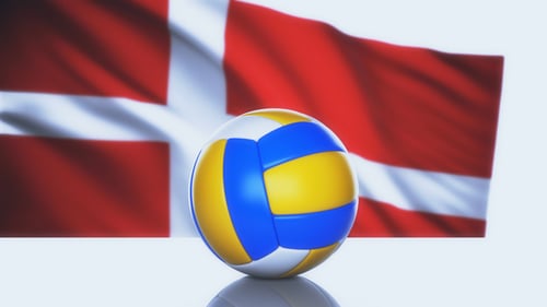 Danish Flag Waving Behind a Rotating Volleyball