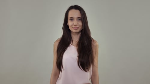 Young Woman Gives Thumbs Up Approval Gesture