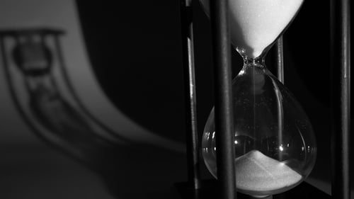 Hourglass with White Sand and Shadow
