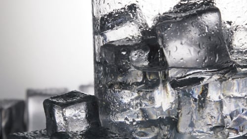 Ice Cubes for Drinks in a Glass of Water