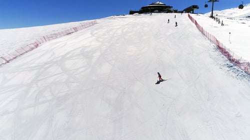 Winter Sports on Snowy Mountain Slope, Aerial View