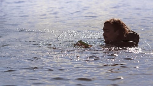 Man in Lake with Spearfishing Spear