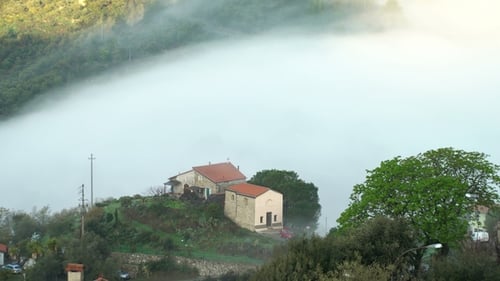Early Foggy Morning in the Alpine Town