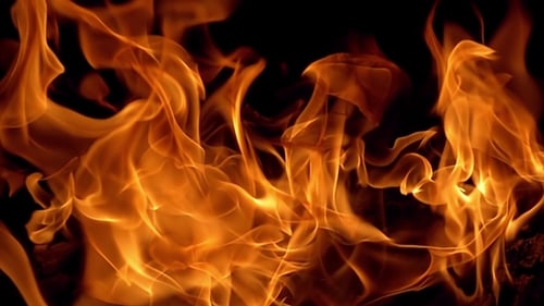 Intense Flames Dancing on Black Background