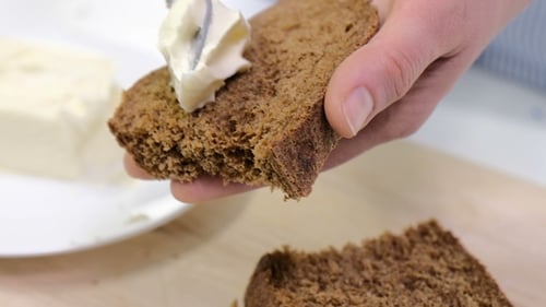 Butter Spread on Dark Bread Slice