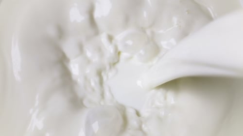 Pouring Milk in the Glass