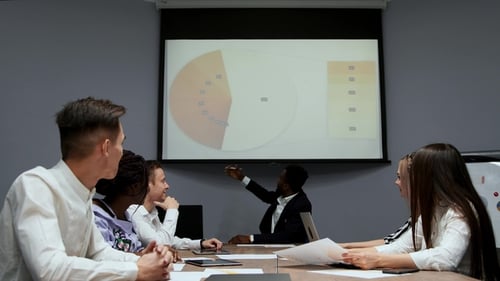 Young Professionals Meeting in Modern Office Environment