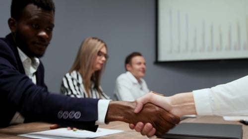 Business Team Handshake After Successful Meeting