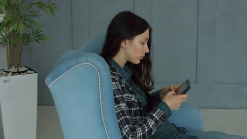 Gorgeous Woman Browsing Social Networks on Tablet