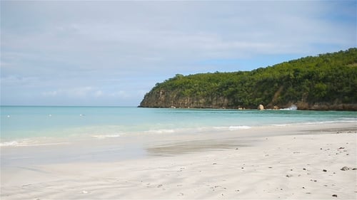 Idyllic Tropical Beach with White Sand, Turquoise Ocean Water and Blue Sky