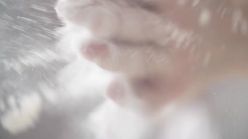 Hands Covered in White Powder Moving