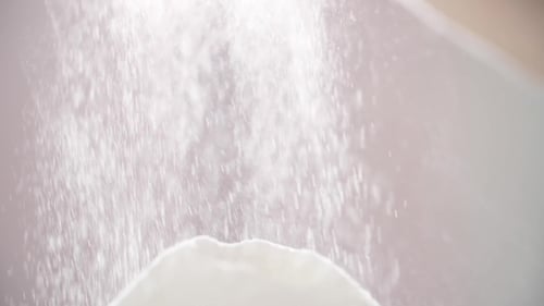 Sugar Mound Receives White Powder in Bright Studio