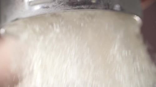 Sifting Flour through Silver Sieve, Macro Shot