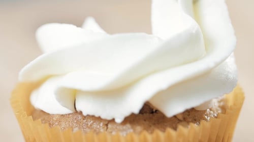 Cupcake Being Frosted with White Icing Macro