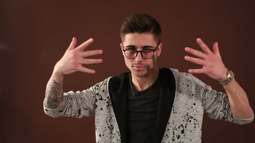 Young Man Gesturing with Hands