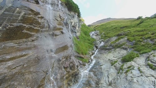 Waterfall at the Grossglockner High Alpine Road in the European Alps