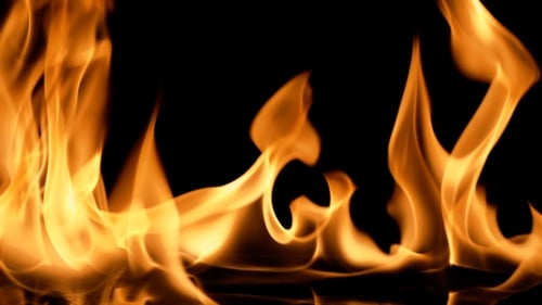 Dynamic Flames Dancing on Black Background